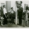 Typical American Family - Farman family raising Wisconsin flag with Harvey Gibson