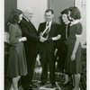 Typical American Family - Flanagan family receiving lease and key from Harvey Gibson