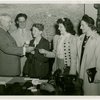 Typical American Family - Farman family children receiving signed baseball and charm bracelet from Harvey Gibson