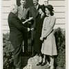 Typical American Family - Deal family receiving key and lease from Harvey Gibson