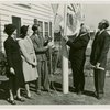 Typical American Family - Deal family raising Illinois flag with Harvey Gibson