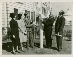 Typical American Family - Deal family raising Illinois flag with Harvey Gibson