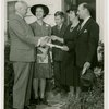 Typical American Family - Grant family receiving lease and key from Harvey Gibson