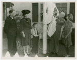 Typical American Family - Gran family raising Minnesota flag with Harvey Gibson