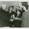 Typical American Family - Grant family children receiving signed baseball and charm bracelet from Harvey Gibson