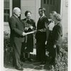 Typical American Family - Joslin family receiving key and lease from Harvey Gibson
