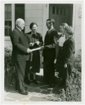 Typical American Family - Joslin family receiving key and lease from Harvey Gibson