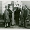 Typical American Family - King family raising Arkansas flag with Harvey Gibson