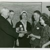 Typical American Family - King family children receiving signed baseball and charm bracelet from Harvey Gibson