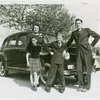 Typical American Family - Karges family standing in front of car