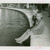Typical American Family - Two Lewis family children dipping feet into fountain