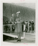 Typical American Family - Mrs. Lewis with son on railing