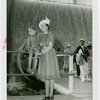 Typical American Family - Mrs. Lewis with son on railing