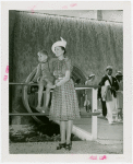 Typical American Family - Mrs. Lewis with son on railing
