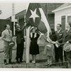 Typical American Family - Leathers family raising Texas flag with Harvey Gibson