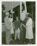 Typical American Family - Madison family raising Massachusetts flag with Harvey Gibson