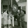 Typical American Family - MacKenzie family raising New Hampshire flag