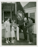 Typical American Family - MacKenzie family raising New Hampshire flag