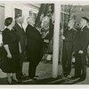 Typical American Family - McCready family raising Pennsylvanida flag with Harvey Gibson