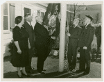Typical American Family - McCready family raising Pennsylvanida flag with Harvey Gibson