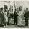Typical American Family - Petersen family raising Minnesota flag with Harvey Gibson
