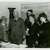 Typical American Family - Petersen family children receiving signed baseball and charm bracelet from Harvey Gibson