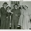 Typical American Family - Pleasants family receiving lease from Harvey Gibson