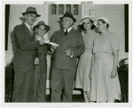 Typical American Family - Pleasants family receiving lease from Harvey Gibson