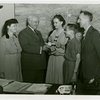 Typical American Family - Pleasants family children receiving signed baseball and charm bracelet