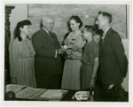 Typical American Family - Pleasants family children receiving signed baseball and charm bracelet