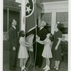 Typical American Family - Ogle family raising Tennessee flag with Harvey Gibson