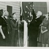 Typical American Family - Pumel family raising Indiana flag with Harvey Gibson
