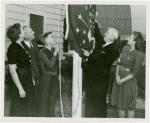 Typical American Family - Pumel family raising Indiana flag with Harvey Gibson