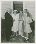 Typical American Family - Rorer family receiving key and lease from Harvey Gibson