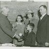 Typical American Family - Spitzna family children receiving signed baseball and charm bracelet