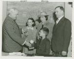 Typical American Family - Spitzna family children receiving signed baseball and charm bracelet