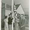 Typical American Family - Spielman family raising American flag with Harvey Gibson