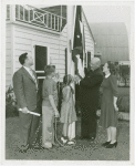 Typical American Family - Sparks family raising Ohio flag with Harvey Gibson