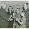 Typical American Family - Sparks family children receiving signed baseball and charm bracelet