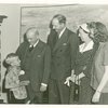 Typical American Family - Woods family receiving key and lease from Harvey Gibson