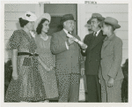 Typical American Family - Williams family receiving lease from Harvey Gibson