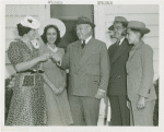 Typical American Family - Williams family receiving key from Harvey Gibson