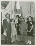 Typical American Family - Ward family raising Alabama flag with Harvey Gibson