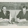 Grover Whalen signing contract with official for Uruguay participation