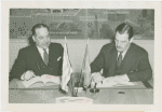 Grover Whalen signing contract with official for Uruguay participation