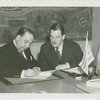 Grover Whalen signing contract with official for Uruguay participation