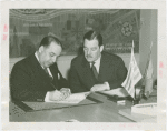 Grover Whalen signing contract with official for Uruguay participation