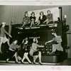 Underwood Elliott Fisher Co. - Women posing with giant typewriter