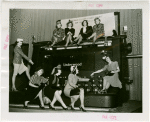 Underwood Elliott Fisher Co. - Women posing with giant typewriter