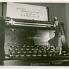 Underwood Elliott Fisher Co. - Woman posing with giant typewriter
